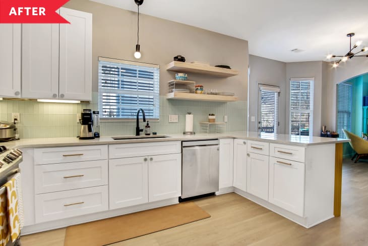 After: Kitchen with U-shaped cabinet layout, seafoam green tile backsplash, open shelving, and light hardwood floors