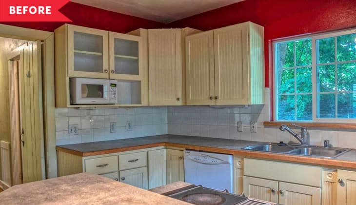 Before: Kitchen with red walls, pale yellow cabinets, basic white square tile backsplash, and dated appliances