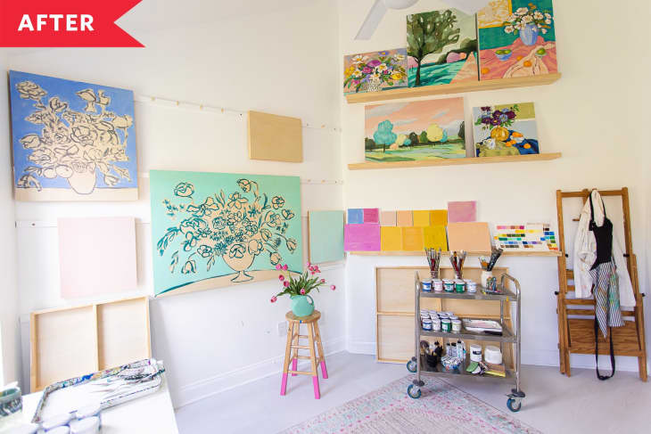 After: Art studio with white walls and shelving system for paintings