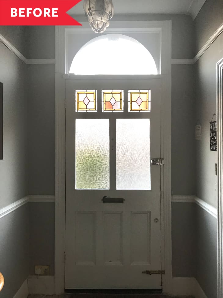 Before: White front door with stained glass