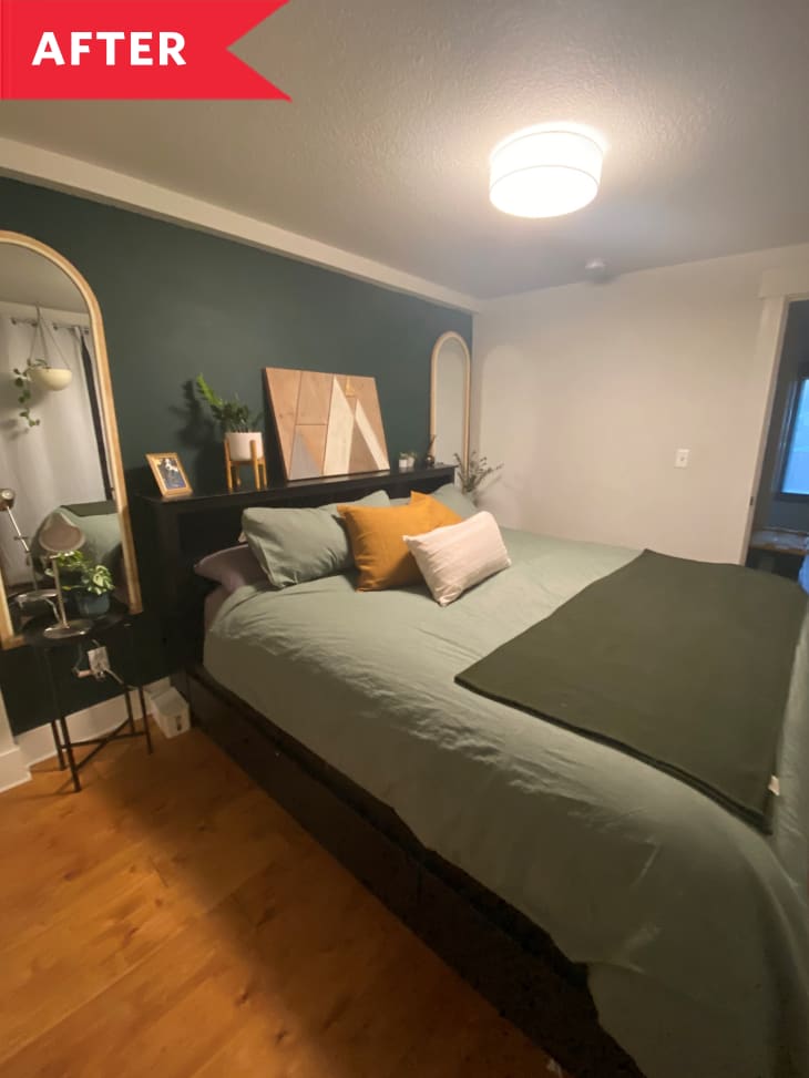 After: Bedroom with dark green accent wall and pale green bedspread