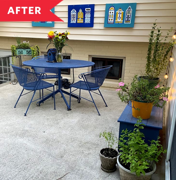 After: Iron outdoor dining table and chairs painted blue on cute patio