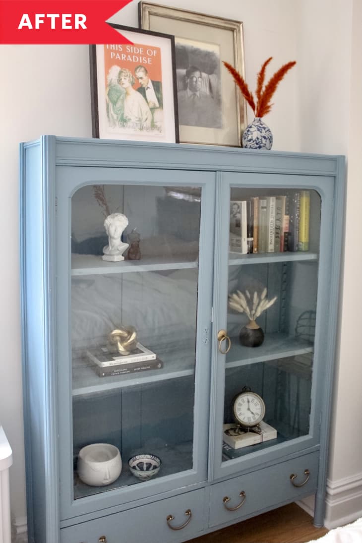 After: Glass-front cabinet with decorative accents inside