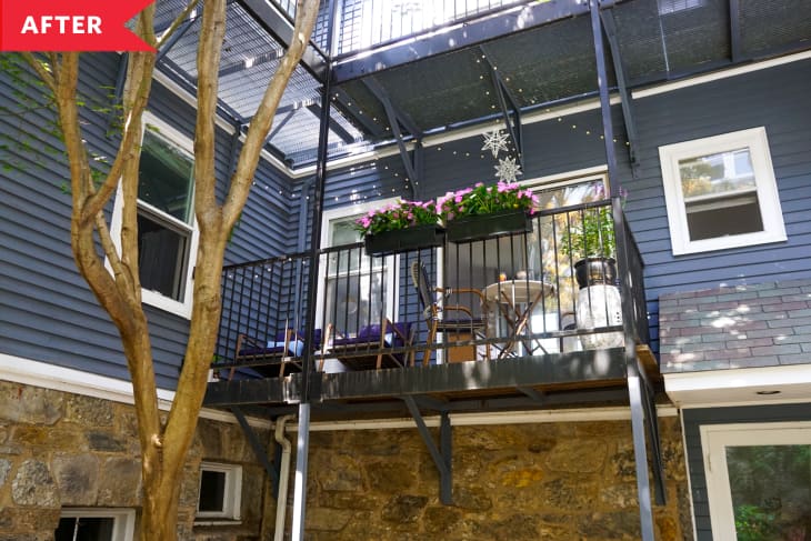 After: Balcony with flower boxes and string lights