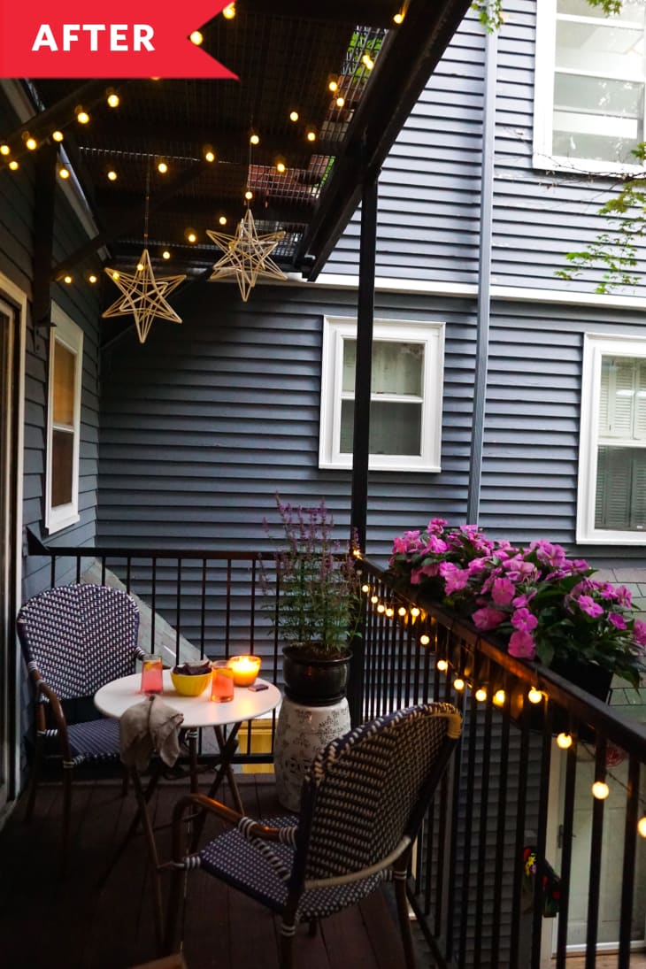 After: Cafe-style table and chairs with star-shaped lights on balcony