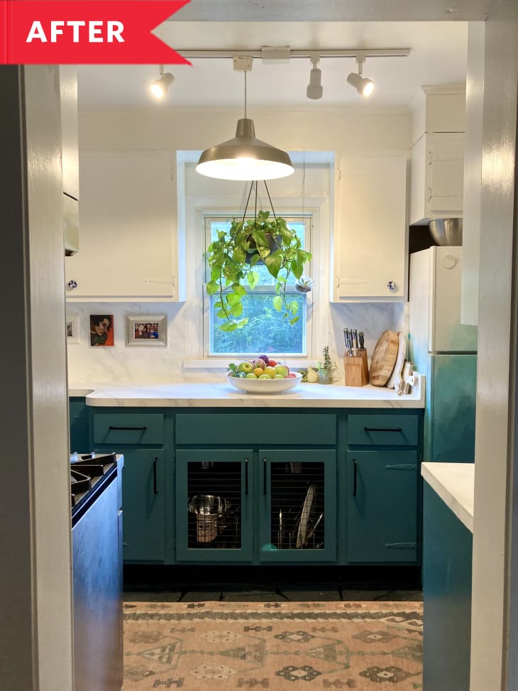 After: Bright and stylish kitchen with teal lower cabinets and white upper cabinets