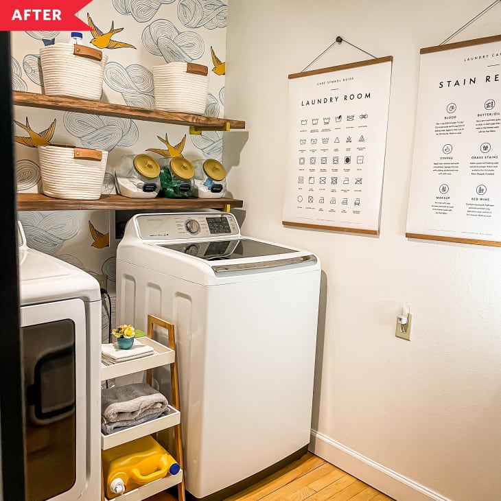 After: Laundry room with white walls, one accent wall with wallpaper and shelves, and washer and dryer