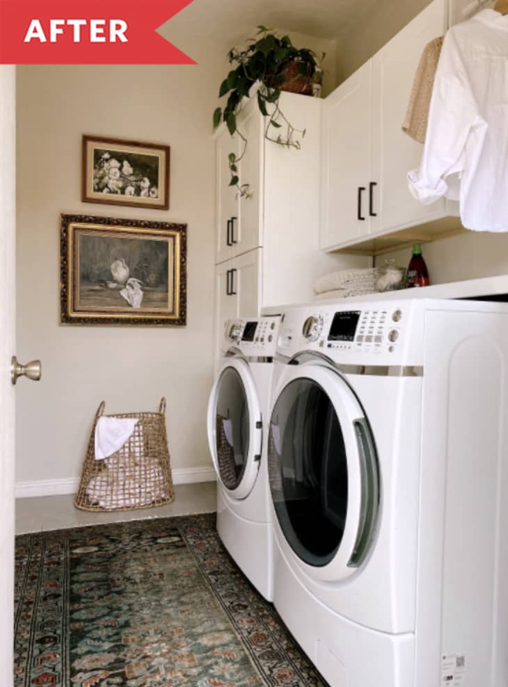 clean laundry room green rug white washer and dryer