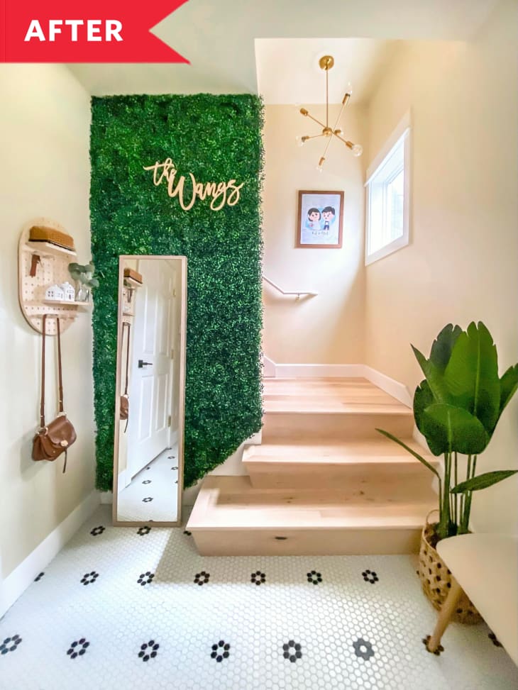 After: Entryway with floor length mirror, shelf, and greenery wall