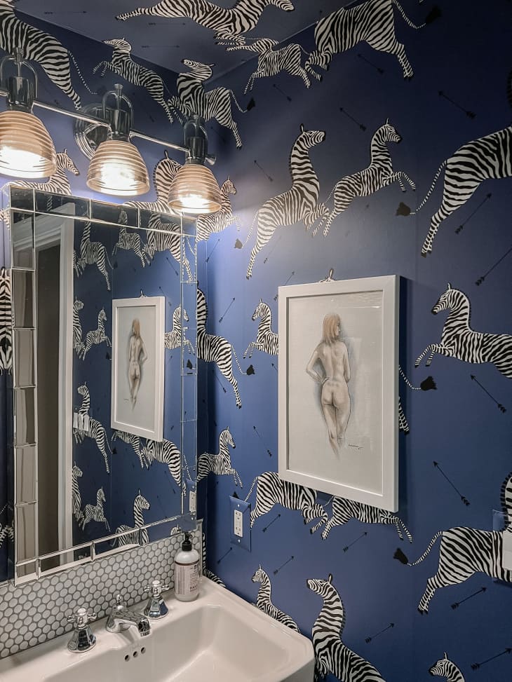 bathroom featuring Scalamandre's zebra-print wallpaper in blue on the walls
