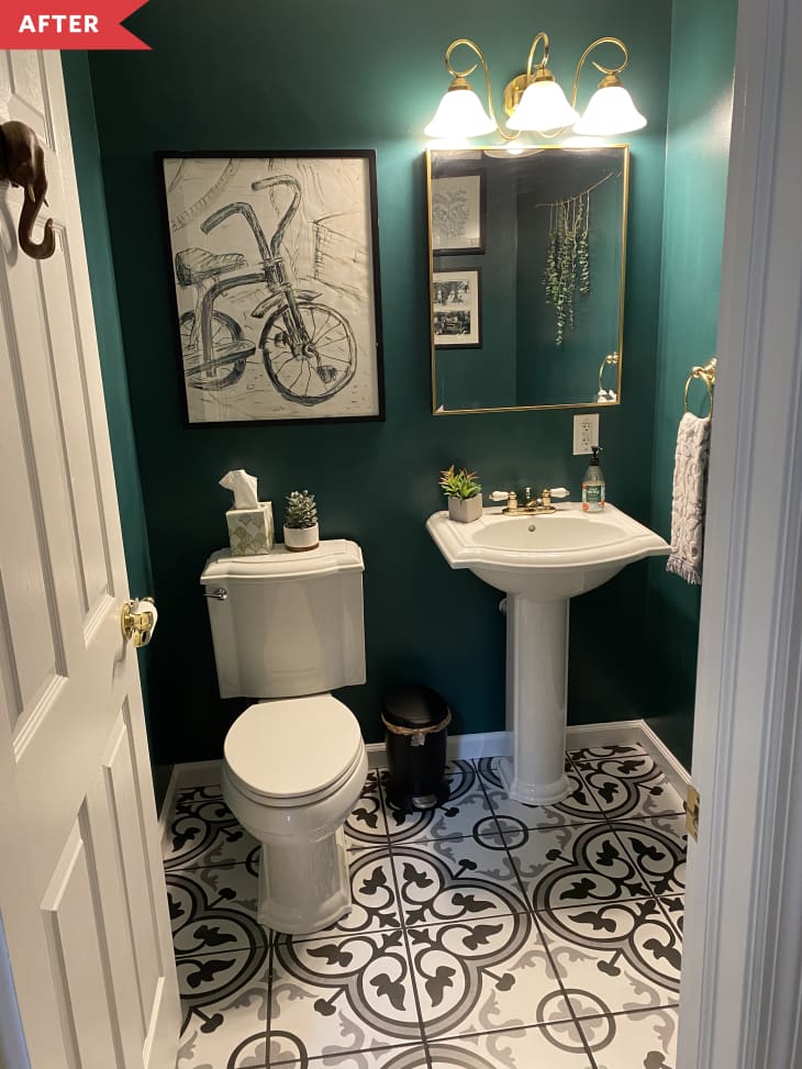 After: Half bathroom with dark green walls, black and white patterned floor, and white pedestal sink