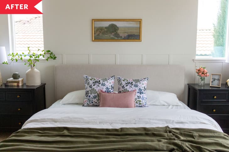 After: Cream-painted bedroom with board and batten walls, upholstered bed, and black nightstands
