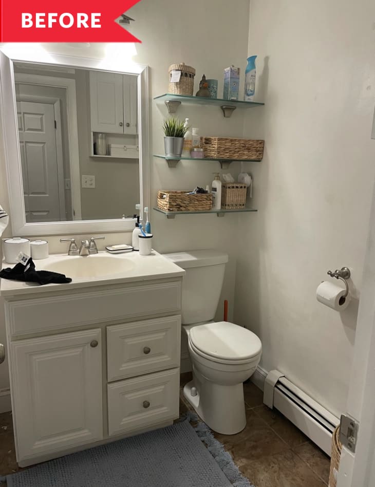 Before: White bathroom with glass shelves above toilet