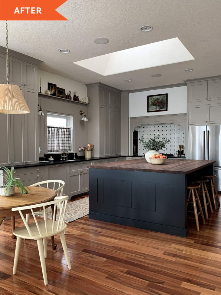 After: Kitchen with gray cabinets and large black island