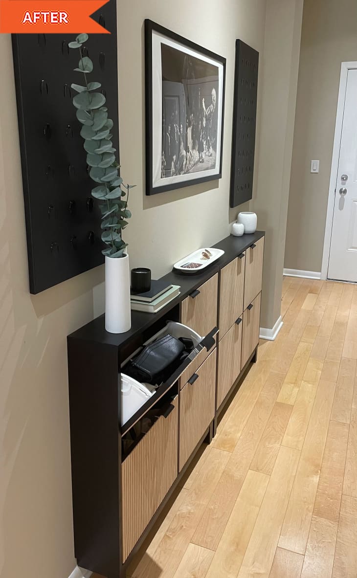 living room with black and brown shoe cabinet