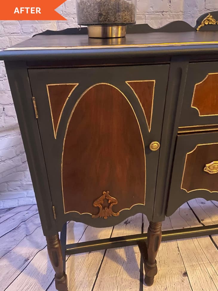 After: black painted cabinet door with brown and gold decorations on door