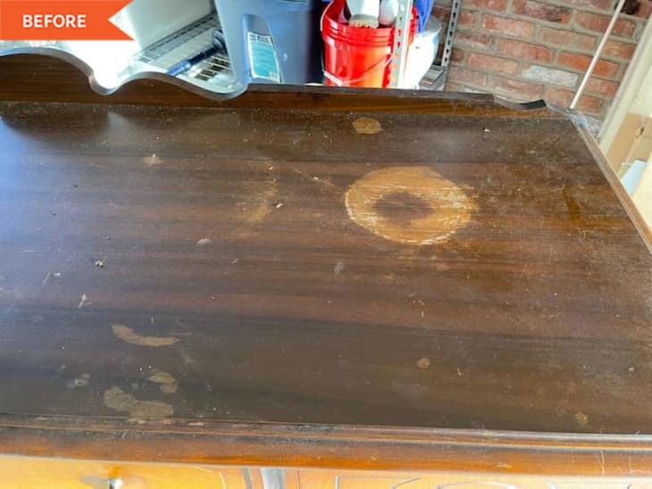 Before: top of wooden console with marks and cup sized stain