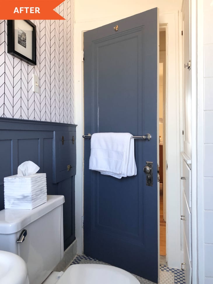 After: blue bathroom door with white towel