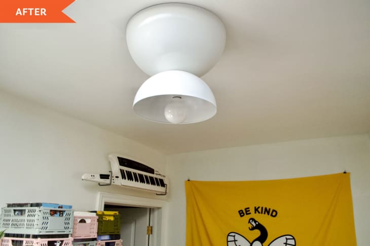 After: white modern light fixture on ceiling