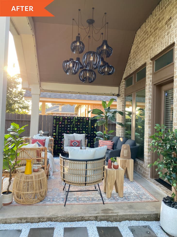 After: covered patio with wicker furniture and rug