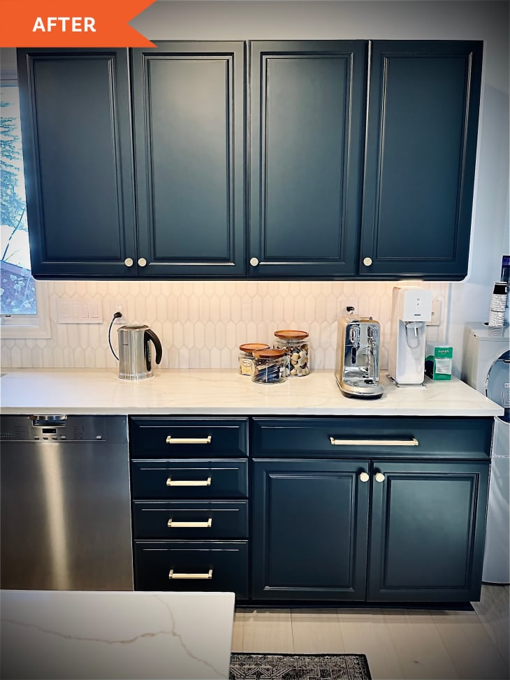 After: dark blue cabinets with stainless steel dishwasher