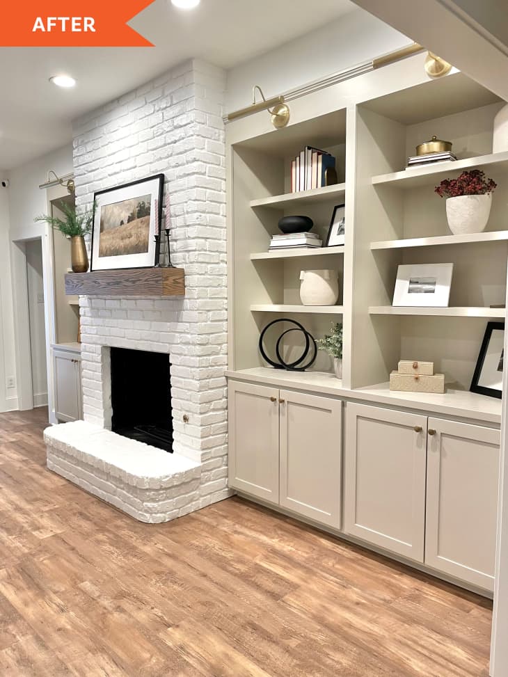 After: Off-white built-in shelving next to fireplace