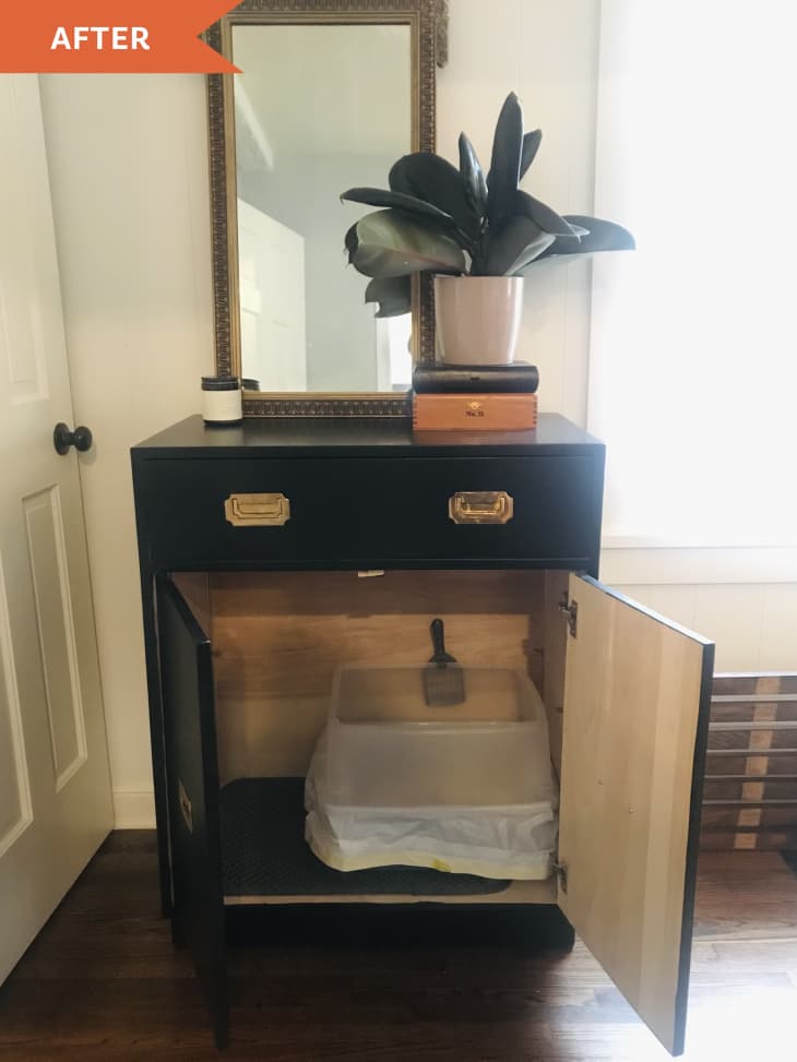 After: Black cabinet with litter box inside