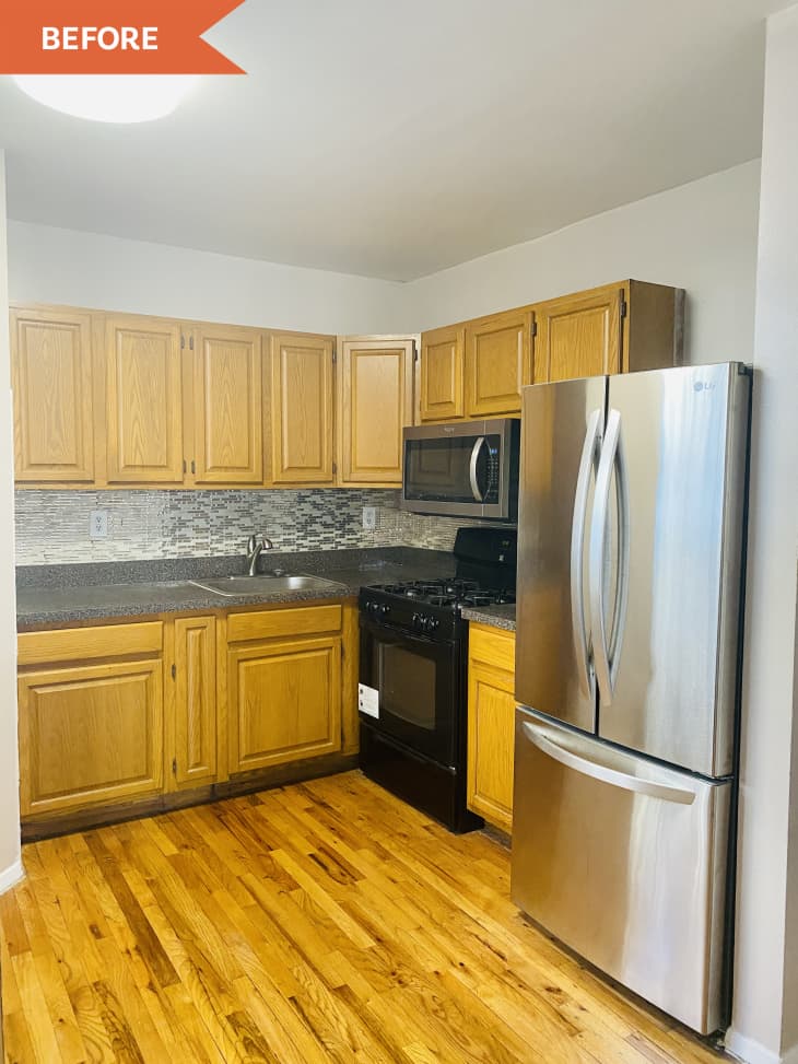 Before: Kitchen with orangey wood cabinets, gray counters, and black and stainless steel appliances