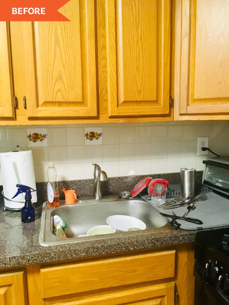 Before: Kitchen with orangey wood cabinets, gray counters, white square tile backsplash, and small stainless steel sink