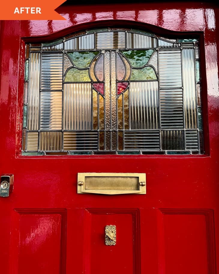 After: Bright red front door with stained glass