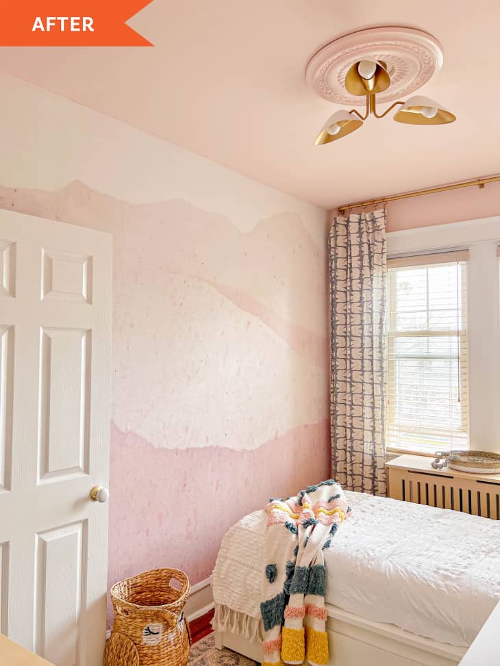 After: A pink and white bedroom with a white bed