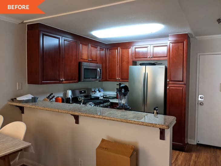 Before: a kitchen with wooden cabinets