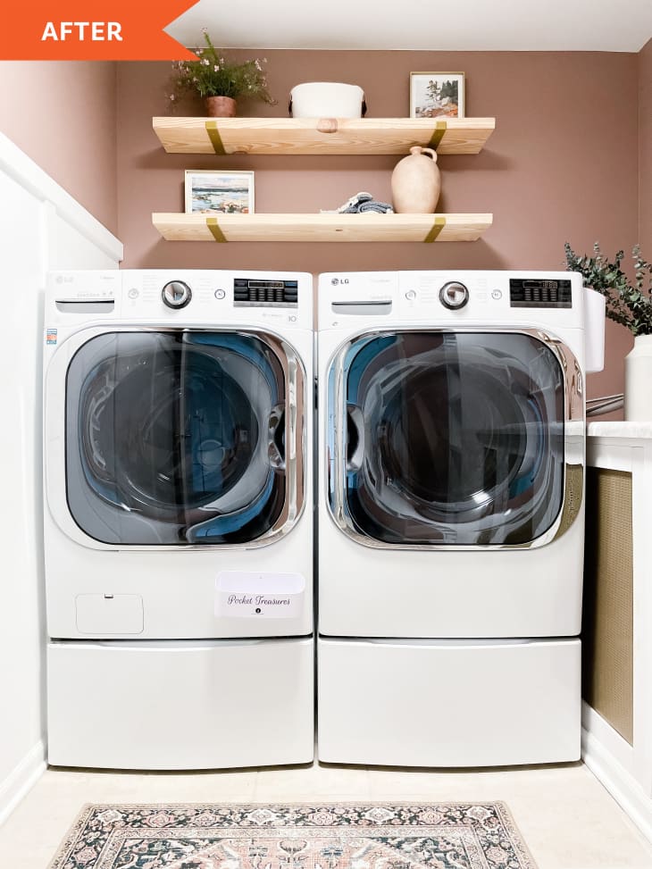 After: pale pink painted laundry room with two machines and shelves