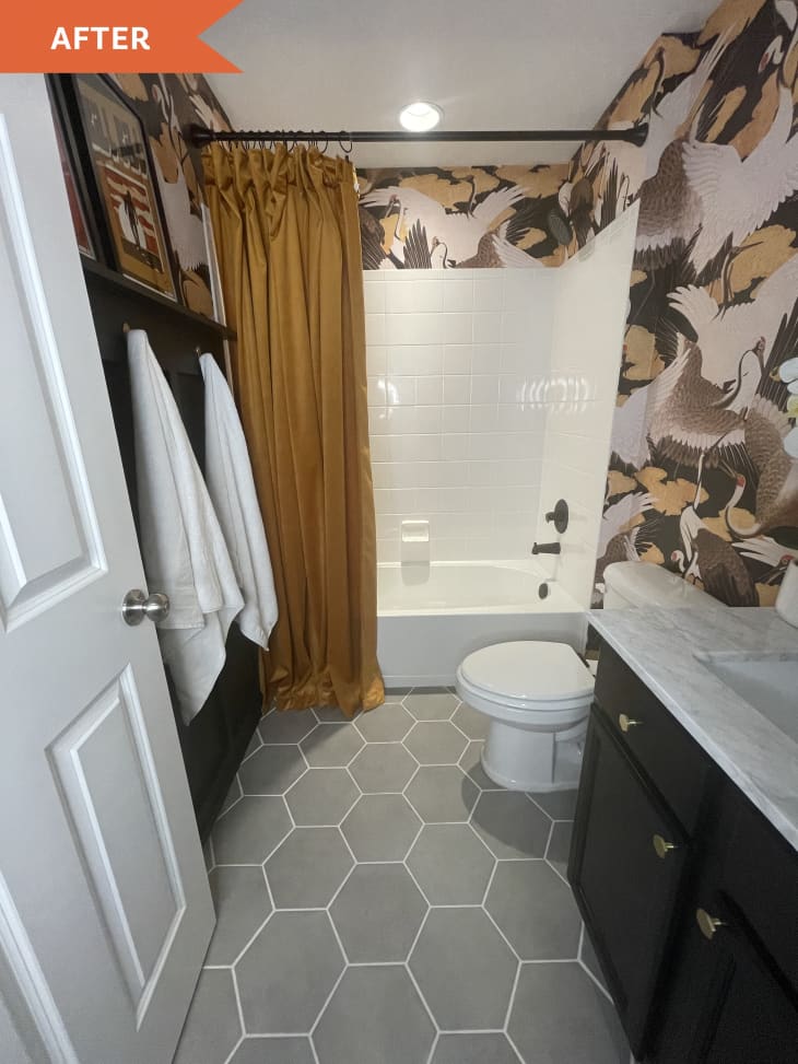 AfteR: Bathroom with bold wallpaper and gold shower curtain