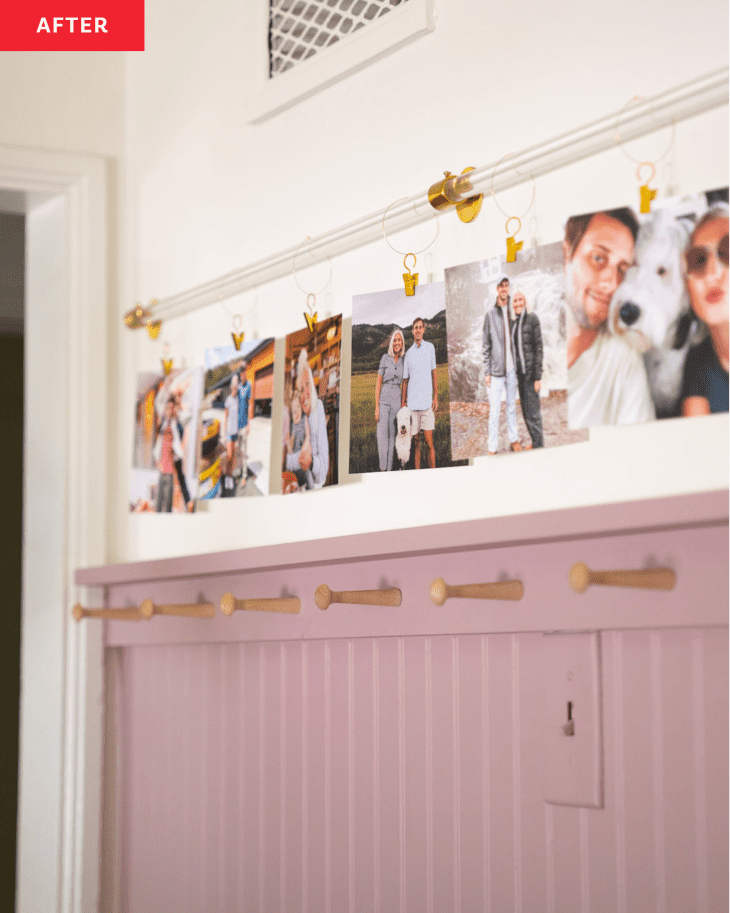 After: Photos hanging from acrylic rod via small metal hoops and clips