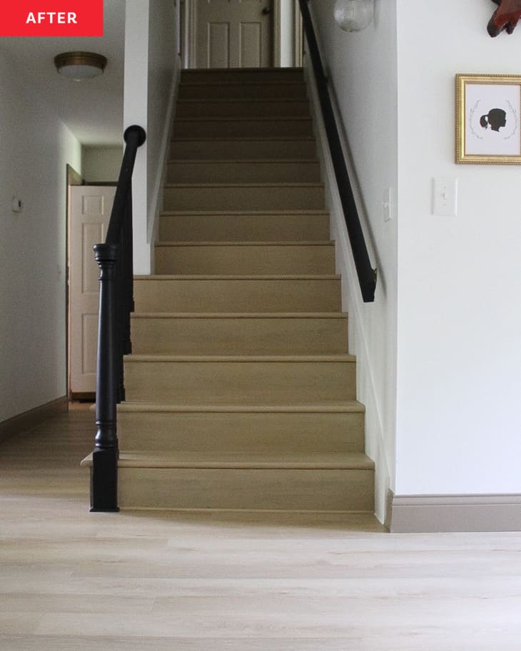 After: a wooden staircase leading to hardwood floors