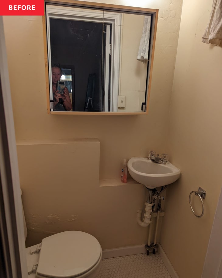Before: a small tan bathroom with a square mirror
