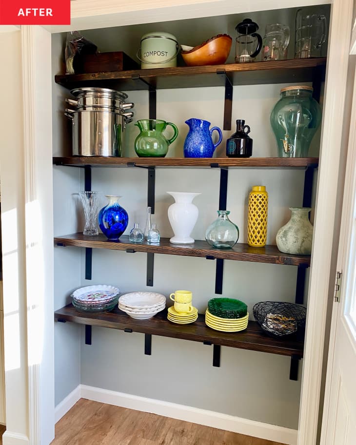 After: a pantry with four wooden shelves holding plates and vases
