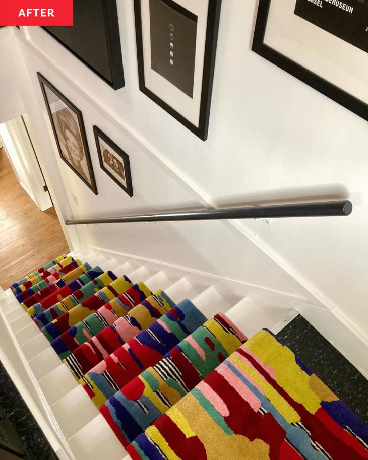 After: the top of a staircase with multi-colored carpeting running down the center of the stairs