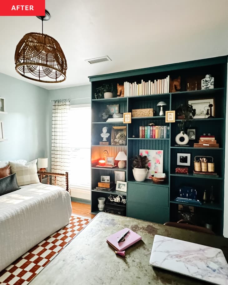 After: a room with a daybed, desk, and green built-in bookcase