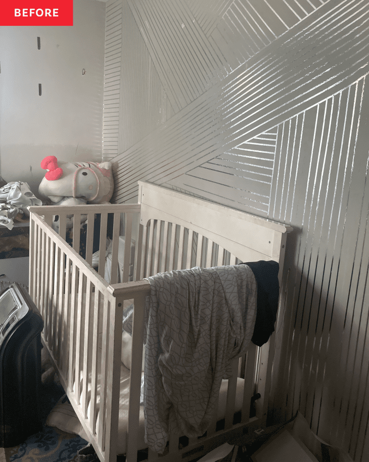 Before: Crib in front of gray textured wall