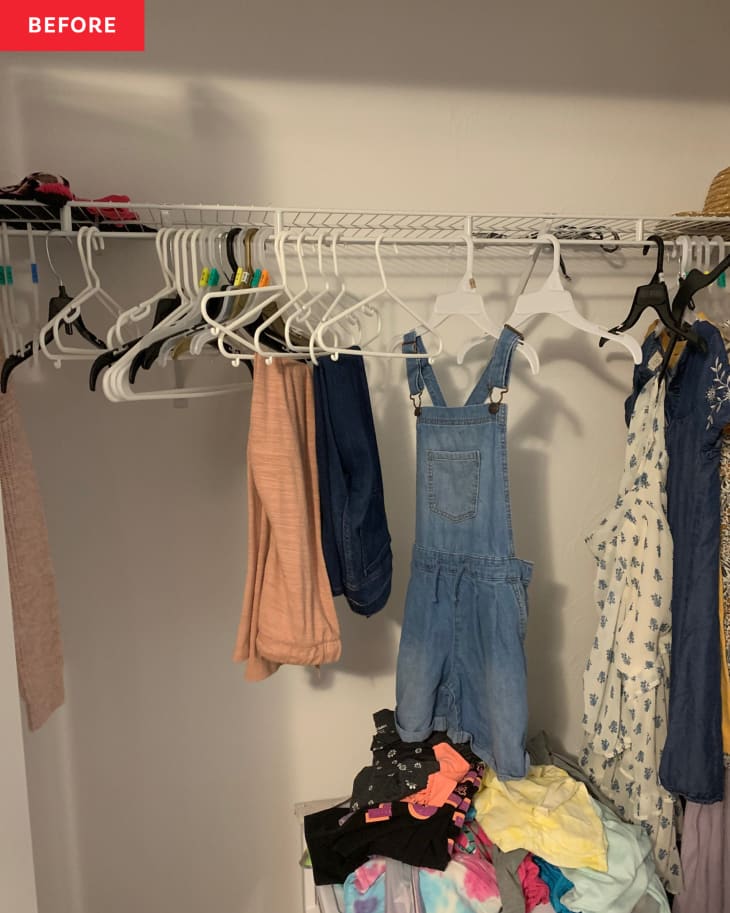 Before: a closet with plastic hangers and children's clothes hanging
