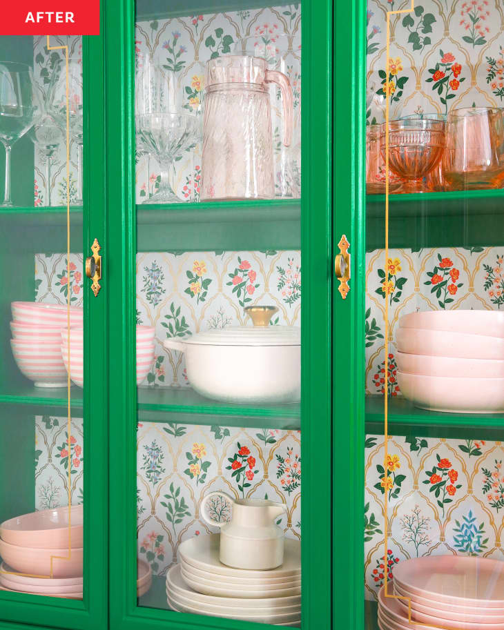 After: a green painted cabinet with three shelves of plates and cookware