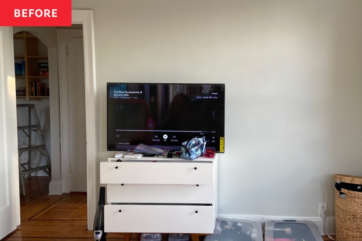 Before: a tv on a white dresser by a white wall