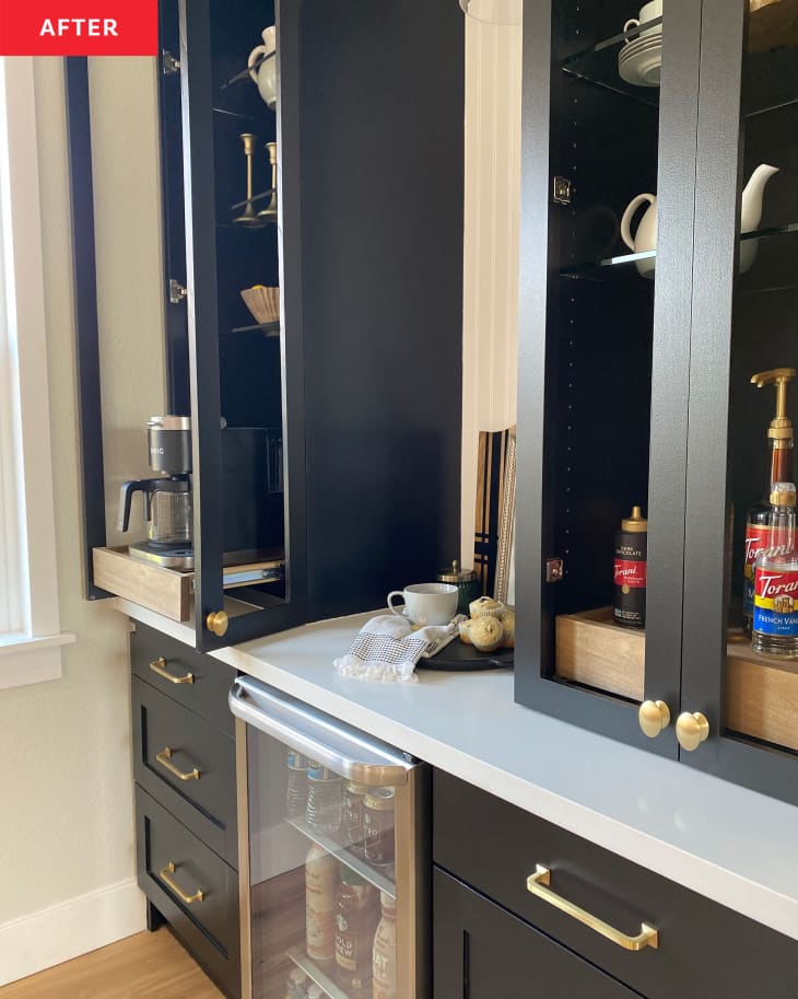 After: a coffee bar with tall black cabinets and white counters