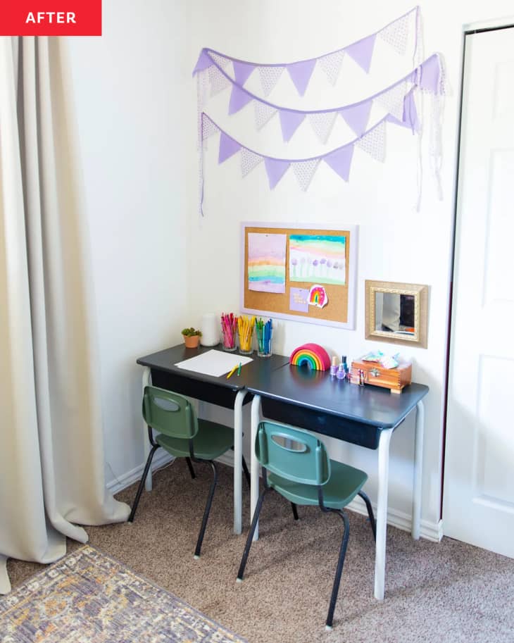 After: Kid's desk in corner with purple pennant flags hanging over top
