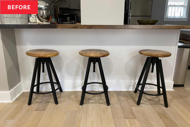 Before: Wooden stools in front of white kitchen bar
