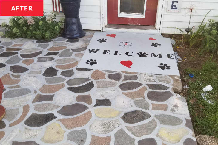 Welcome mat on patio after painting stone pavers.