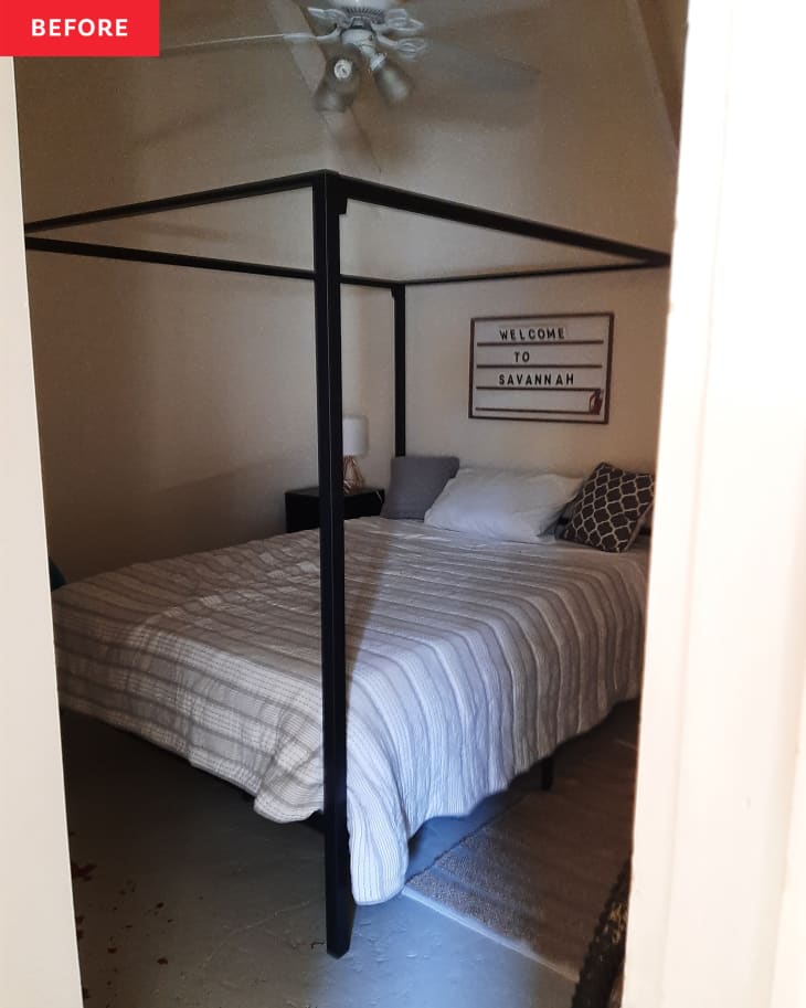 Before: Black four-post bed in blah bedroom