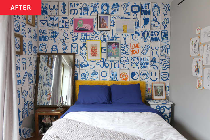 "After" photo of a bed and wall/s after makeover. Wall is covered with white "notes" and drawings (in blue). Bed has gold fuzzy headboard, navy blue pillows.